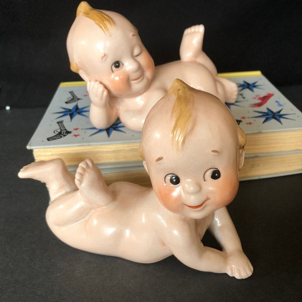 Lefton pair of large 5" & 6" bisque Kewpie figurines, winking and not blinking; kitsch; ca 1960s;