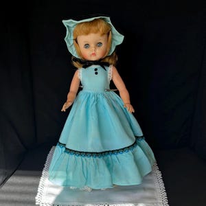 Vogue 15&quot; Miss Ginny doll, in original dress, with bonnet, shoes, crinoline, panties and stockings; ca 1960s
