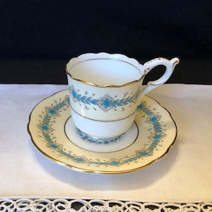 Coalport &#39;Queen Elizabeth&#39; pattern demitasse cup and saucer; turquoise, gold & cream bone china;  Made in England; ca 1940s