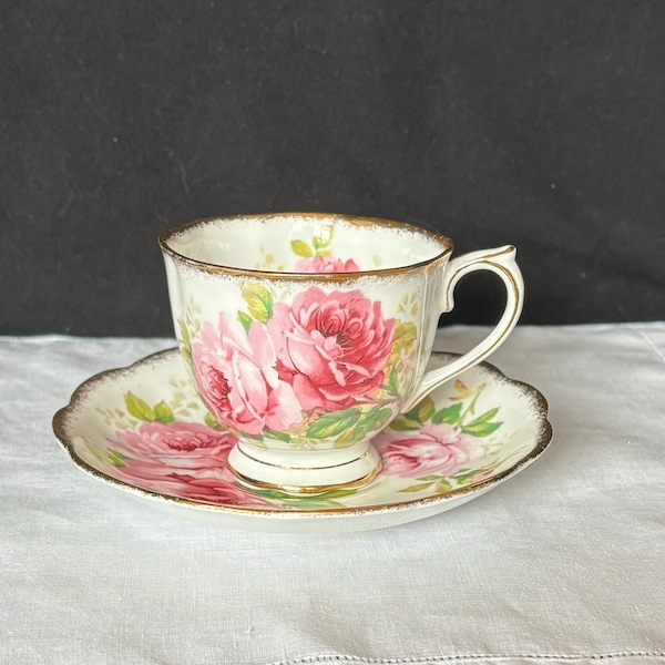 Royal Albert 'American Beauty' tea or coffee cup and saucer, pink roses; made in England c 1941-1998