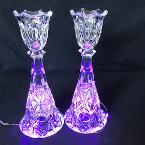 Pair of cut glass tulip shape candlestick holders; 24% lead glass; vintage