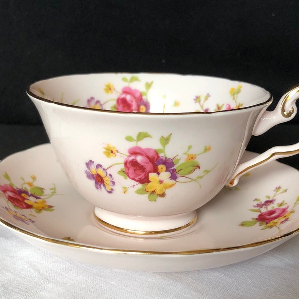 Pretty mid century Tuscan bone china tea or coffee cup and saucer; lt pink background with mixed floral; made in England, ca 1947-1960