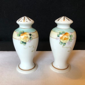 Pretty hand painted porcelain yellow rose salt & pepper shakers; lt blue/aqua and yellow bands w/ gold trim; made in Japan ca 1940s-1960s