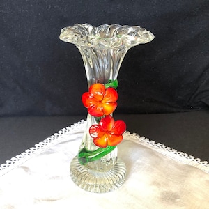 Beautiful art glass flower wrapped bud vase; clear with red/orange/yellow blown glass flowers over green stem; 7 1/2&quot; high
