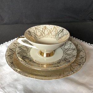 Winterling 3-piece tea or coffee cup with desser plate; MCM; muted flower/poppy design with elaborate gold; Bavaria, Germany, ca 1940s-1950s