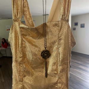 May include: A rustic wooden sign with the text "Welcome to our home" in white lettering. The sign features a distressed finish and a simple, inviting design, perfect for entryway decor.