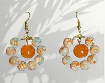 Hoop earrings with orange marble style glass bead and apricot marble style glass beads with gold nickel free  earwires