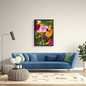 May include: A framed print of a colorful bouquet of tulips in shades of pink, red, yellow, and orange. The tulips are arranged in a vase and are surrounded by green leaves.