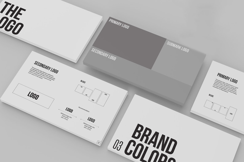 May include: A brand guide with a white background and black text. The guide includes information about the primary logo, secondary logo, submark logo, and brand colors. The text "THE LOGO" is at the top of the page.