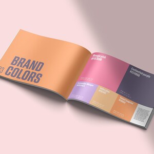 May include: Open book with a color palette for a brand. The colors are lavender whisper, golden glow, rouge pink, sunset tangerine, and enchanted purple. The hex codes for each color are listed.