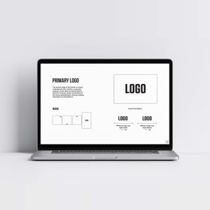 May include: A laptop screen displaying a black and white graphic design guide for a logo. The guide includes the text "PRIMARY LOGO" and "LOGO" with instructions for minimum logo size in pixels and inches.