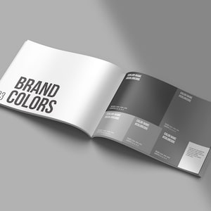 May include: A page from a brand guide with the title "BRAND COLORS" and a color palette of different shades of gray. Each color swatch is labeled with a color name and hex code.