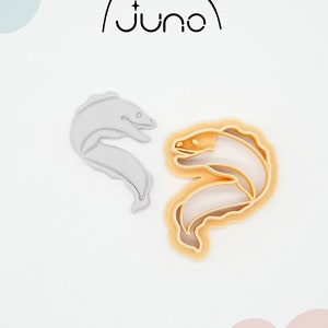 May include: Two 3D printed cookie cutters shaped like moray eels. The cutters are made of PLA plant-based plastic and are non-toxic. The cutters are shown on a white background.