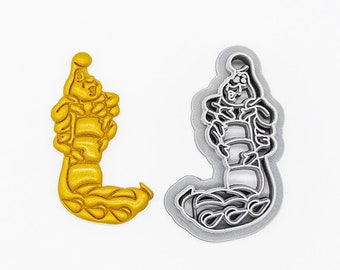 May include: Two 3D printed cookie cutters in the shape of a scorpion. One cutter is gold and the other is silver. The cutters are made of PLA plant-based plastic, non-toxic.