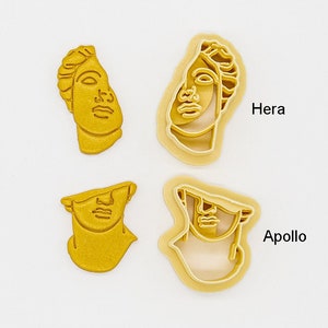 May include: Four 3D printed cookie cutters shaped like the faces of Greek gods Hera and Apollo. The cutters are made of PLA plant-based plastic and are non-toxic.