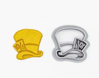 May include: A 3D printed cookie cutter in the shape of the Mad Hatter's hat from Alice in Wonderland. The cutter is made of PLA plant-based plastic and is non-toxic. The cutter is shown in both its printed form and its outline.