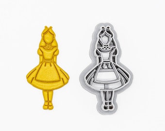 May include: A 3D printed cookie cutter in the shape of Alice from Alice in Wonderland. The cutter is made of PLA plant-based plastic and is non-toxic. The cutter is shown in two views: one with a gold finish and one with a silver finish.