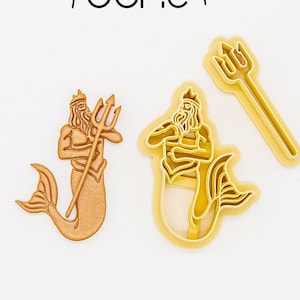 May include: A set of three 3D printed cookie cutters, made of PLA plant-based plastic, featuring a mermaid, a trident, and the text "Juno".