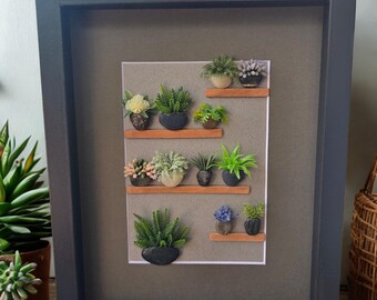 Framed Pebble Art - Plants on Shelves with gray background