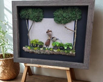 Framed Pebble Art - Outdoor Gardener with gray and black background