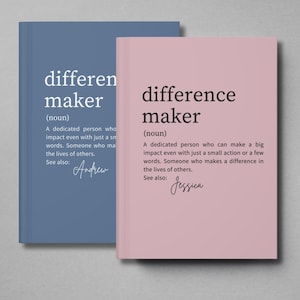 May include: Two pink and blue notebooks with the word "difference maker" and the definition of the word. The definition includes the text "See also: Andrew" and "See also: Jessica".