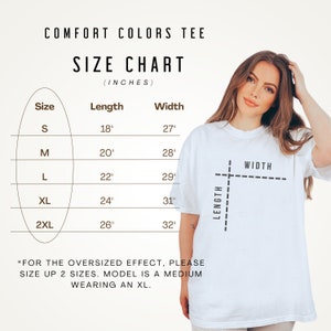K&ouml;nnte beinhalten: Gr&ouml;&szlig;entabelle f&uuml;r ein T-Shirt in den Gr&ouml;&szlig;en S, M, L, XL und 2XL. Die Tabelle zeigt die L&auml;nge und Breite jeder Gr&ouml;&szlig;e in Zoll an. Der Text lautet "Comfort Colors Tee" und "Size Chart (Inches)".