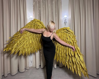 Gouden glitter engelenvleugels: flexibele kostuumvleugels voor cosplay