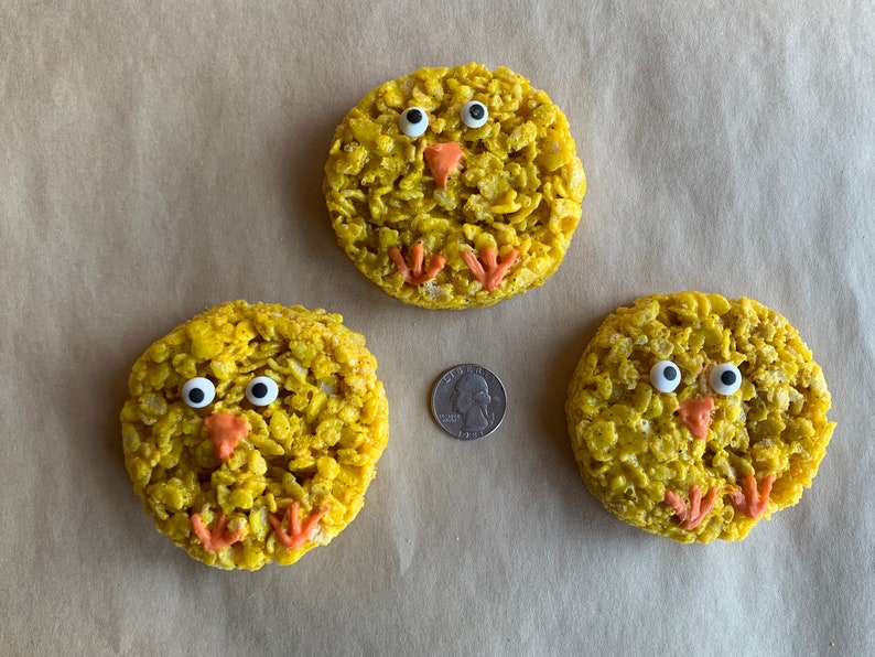 Gluten-Free Brown Butter and Sea Salt Chick Rice Crispy TreatsDecorated Easter Sugar Cookies with Quarter for size reference.