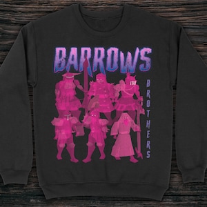 May include: A black sweatshirt featuring a pink graphic design of a group of figures with the text "BARROWS BROTHERS" in a purple and blue gradient.