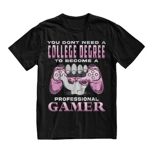 May include: Black t-shirt with a pink video game controller graphic and the text "You don't need a college degree to become a professional gamer".