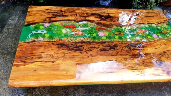 Epoxy river table with fish deals