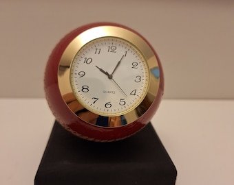 Upclycled cricket ball stylish different clock. Great gift for him or her. Looks good in any room. In stock ready to be posted out.