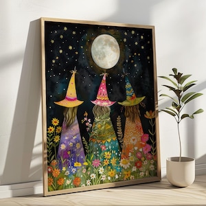 May include: Three witches wearing colorful hats and dresses stand in a field of flowers under a full moon and starry night sky.