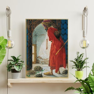 May include: A painting of a man in a red robe and a colorful turban, holding a staff and looking at a group of turtles on the floor. The man is standing in a doorway with a blue and white patterned wall behind him.