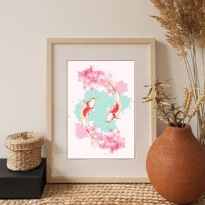 May include: A framed watercolor painting of two koi fish swimming in a circle surrounded by pink cherry blossoms. The background is a light blue watercolor wash.