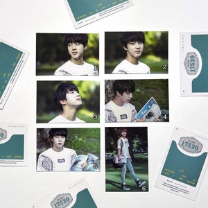 May include: Six photo cards featuring a young man with dark hair. The cards are numbered 1 through 6. The cards are all white with a green border. The cards are all the same size. The cards are all in a row. The cards are all in a white background.