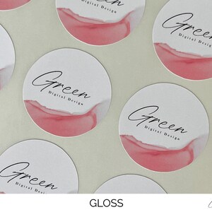 May include: Multiple circular stickers featuring a white background with a soft pink watercolor wash at the bottom. Each sticker displays the black cursive text Green above the smaller sans-serif text Digital Design in a clean, professional layout.