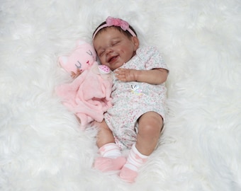 19" Long High End Baby Girl, Reborn Baby, Vinyl Body with Fabric Torse.