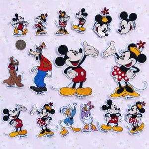 May include: A collection of 15 iron-on patches featuring various Disney characters, including Mickey Mouse, Minnie Mouse, Goofy, Donald Duck, and Daisy Duck. The patches are colourful and feature a variety of poses and expressions. The patches are all labelled with the Disney logo.