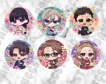 May include: Six round buttons featuring colourful backgrounds and images of anime characters. The characters are wearing traditional Japanese clothing and are surrounded by cherry blossoms.