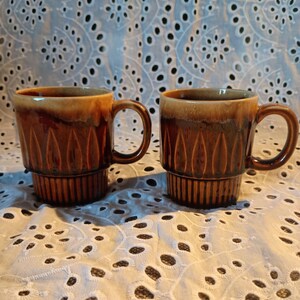 Vintage pair of stackable drip glaze coffee mugs