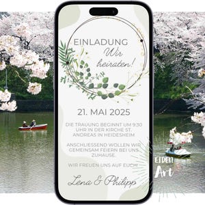 May include: A digital invitation on a smartphone screen with a green floral wreath and the text "EINLADUNG Wir heiraten! 21. MAI 2025 DIE TRAUUNG BEGINNT UM 9:30 UHR IN DER KIRCHE ST. ANDREAS IN HEIDESHEIM ANSCHLIESSEND WOLLEN WIR GEMEINSAM FEIERN BEI UNS ZUHAUSE WIR FREUEN UNS AUF EUCH! Lena & Philipp"