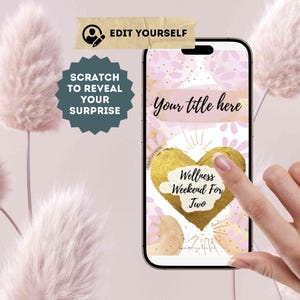 Könnte beinhalten: Ein Smartphone zeigt eine digitale Rubbellos-Vorlage mit einem goldenen Herz. Auf dem Bildschirm steht der Text "Your title here" und "Wellness Weekend For Two" mit rosa Blumenakzenten. Ein Etikett zeigt "EDIT YOURSELF" und "SCRATCH TO REVEAL YOUR SURPRISE."