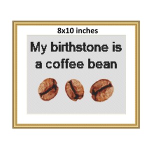 May include: A framed 8x10 inch print with the text "My birthstone is a coffee bean" and three coffee beans.