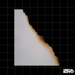 May include: A white piece of paper with a burnt edge. The paper is slightly wrinkled and has a rough texture.