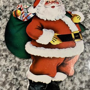 Vintage kerstman karton gestanst