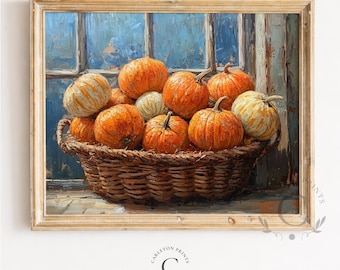 Puede incluir: Una pintura al óleo en un marco de madera que representa una cesta tejida llena de varias calabazas naranjas y blancas. Las calabazas están dispuestas en un grupo frente a un marco de ventana azul con pinceladas y texturas visibles.