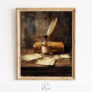 May include: A framed wall art print depicting a dark, moody still life scene. A clear glass inkwell with a quill pen sits atop a thick, gold-colored leather-bound book. Several pieces of aged, handwritten parchment paper are scattered on the surface.