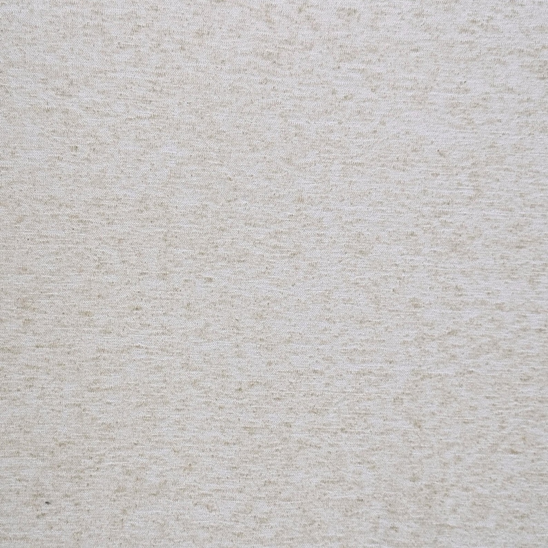 Close-up texture of unbleached hemp and organic cotton jersey fabric