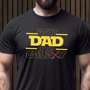 Best Dad In The Galaxy Shirt, Funny Star Wars Dad Shirt, Galactic Dad Gift, Father’s Day Shirt, Sci-Fi Lover Dad Tee, Dad Birthday Gift Tee